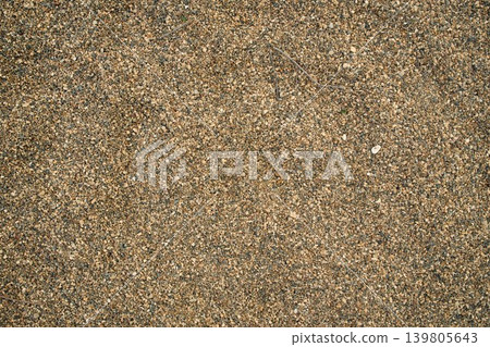 Smooth uniform layer of bulk river sediment sand and aggregate, providing an authentic texture pattern for website layouts Smooth uniform layer of bulk river sediment sand and aggregate, providing an authentic texture pattern for website layouts 139805643
