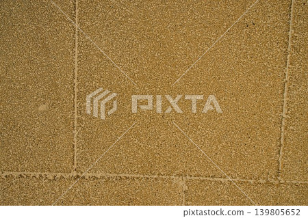 Aesthetic geometric background of textured outdoor rubber mat pavement, perfect for construction 139805652