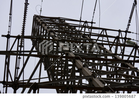 Abstract industrial architecture: metal beams and power cables close-up Abstract industrial architecture: metal beams and power cables close-up 139805687