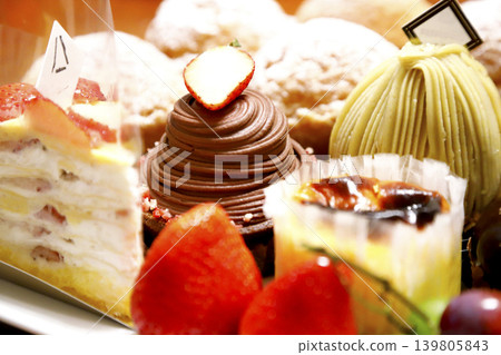 Delicious-looking shortcake and fruit arranged on a plate Delicious-looking shortcake and fruit arranged on a plate 139805843