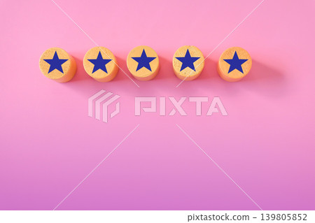Star sign over wood cube on color background. Star sign over wood cube on color background. 139805852