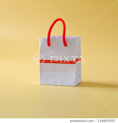 Empty shopping bag, Front view on background. 139805955
