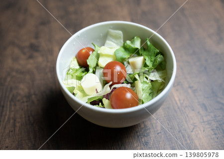 Lettuce, tomato, and cheese salad Lettuce, tomato, and cheese salad 139805978