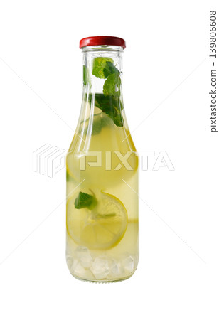Glass Bottle with Lid Filled with Lemonade and Ice on White 139806608