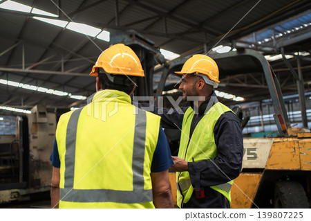 Workers Factory or Engineering work at factory site check up machine or products in site. Workers Factory or Engineering work at factory site check up machine or products in site. 139807225