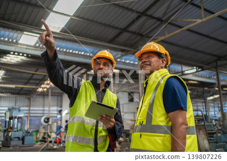 Workers Factory or Engineering work at factory site check up machine or products in site. Workers Factory or Engineering work at factory site check up machine or products in site. 139807226