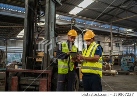 Workers Factory or Engineering work at factory site check up machine or products in site. Workers Factory or Engineering work at factory site check up machine or products in site. 139807227