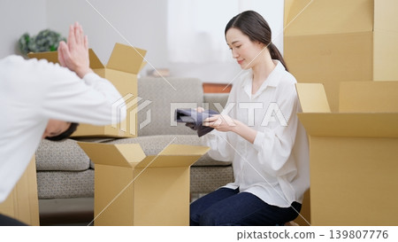 A man tries to stop her from leaving. A man tries to stop her from leaving. 139807776