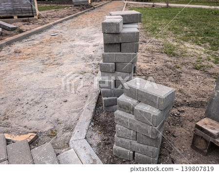 Stacked Concrete Paving Bricks for Walkway Stacked Concrete Paving Bricks for Walkway 139807819