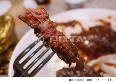 Juicy Steak on Fork Close-up Juicy Steak on Fork Close-up 139808110