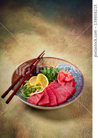 tuna sashimi with daikon and wakame salad, pickled ginger, in a bowl, tuna sashimi with daikon and wakame salad, pickled ginger, in a bowl, 139808215