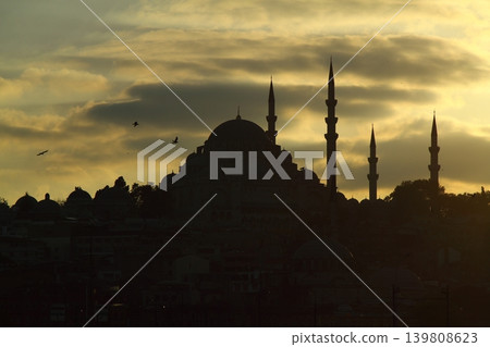 Sillhouette of Istanbul at sunset. Ramadan time with the muslim city istanbul silhouette Sillhouette of Istanbul at sunset. Ramadan time with the muslim city istanbul silhouette 139808623