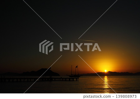 Seaside town of Turgutreis and spectacular sunsets Seaside town of Turgutreis and spectacular sunsets 139808973