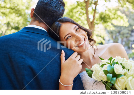 Wedding couple, bride and hug with bouquet outdoor for celebration event, commitment and union. Happy people, woman and portrait with flowers at marriage ceremony for love, partnership and loyalty Wedding couple, bride and hug with bouquet outdoor for celebration event, commitment and union. Happy people, woman and portrait with flowers at marriage ceremony for love, partnership and loyalty 139809034