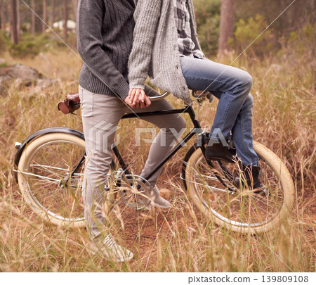 Couple, outdoor and bike with handlebars for carrying person for adventure, vacation or sustainability. People, retro bicycle and nature and path for cycling journey on holiday with ecology in woods Couple, outdoor and bike with handlebars for carrying person for adventure, vacation or sustainability. People, retro bicycle and nature and path for cycling journey on holiday with ecology in woods 139809108