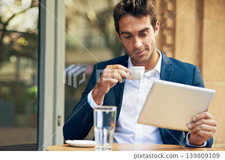 Businessman, tablet and coffee at cafe for online research or communication, internet or social media. Male person, espresso and reading at city restaurant in Italy for work trip, networking or email Businessman, tablet and coffee at cafe for online research or communication, internet or social media. Male person, espresso and reading at city restaurant in Italy for work trip, networking or email 139809109