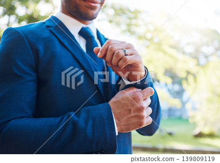 Wedding, man and hands with cuffs for getting ready, preparation and adjust suit in nature. Person, groom and outdoor with fashion for special event, marriage commitment and start of ceremony Wedding, man and hands with cuffs for getting ready, preparation and adjust suit in nature. Person, groom and outdoor with fashion for special event, marriage commitment and start of ceremony 139809119
