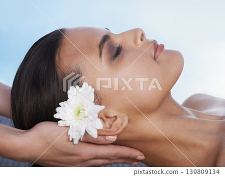 Sleeping, head massage or hands with woman or flower in spa for wellness, treatment or hospitality. Peace, relax or client with masseuse in hotel on holiday vacation for beauty therapy in a resort Sleeping, head massage or hands with woman or flower in spa for wellness, treatment or hospitality. Peace, relax or client with masseuse in hotel on holiday vacation for beauty therapy in a resort 139809134