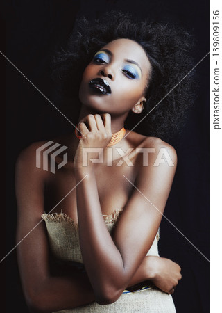 Cosmetics, beauty and portrait of black woman on dark background with confidence, style and pride. Culture, aesthetic and isolated African person with fashion, trendy accessories and makeup in studio Cosmetics, beauty and portrait of black woman on dark background with confidence, style and pride. Culture, aesthetic and isolated African person with fashion, trendy accessories and makeup in studio 139809156