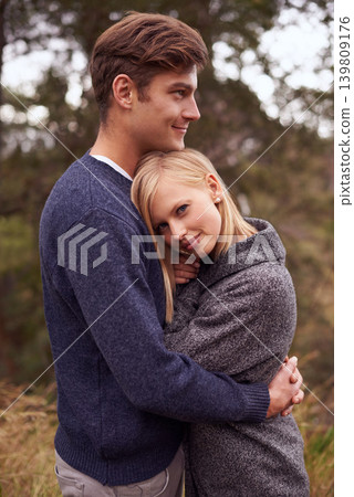Couple, portrait and smile with hug outdoor in countryside for holiday, vacation and anniversary getaway in forest. Love, man and woman with face, happy and embrace in woods for relationship and care Couple, portrait and smile with hug outdoor in countryside for holiday, vacation and anniversary getaway in forest. Love, man and woman with face, happy and embrace in woods for relationship and care 139809176