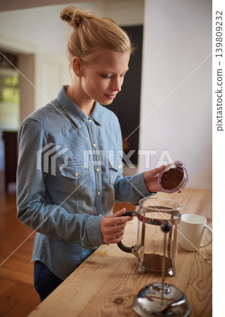 Woman, coffee and french press in kitchen or prepare with plunger for morning beverage, caffeine or drinking. Female person, counter and breakfast equipment with mug for espresso, cappuccino or home Woman, coffee and french press in kitchen or prepare with plunger for morning beverage, caffeine or drinking. Female person, counter and breakfast equipment with mug for espresso, cappuccino or home 139809232