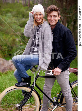 Couple, portrait and park with retro bicycle on holiday, adventure and date with sustainable transport. Man, woman and vintage bike with smile for holiday with journey in woods, path or environment 139809440