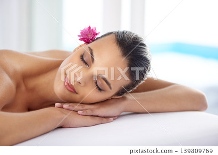 Woman, massage and organic treatment at spa, wellness and beauty therapy for body care. Female person, calm and serene or dermatology, cosmetics and resting at resort hotel and peace or relaxing Woman, massage and organic treatment at spa, wellness and beauty therapy for body care. Female person, calm and serene or dermatology, cosmetics and resting at resort hotel and peace or relaxing 139809769