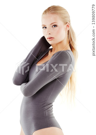 Fashion, portrait and woman in leotard in studio for creative, art and ballet dancing entertainment. Confidence, beauty and serious female dancer in body suit for ballerina style by white background. Fashion, portrait and woman in leotard in studio for creative, art and ballet dancing entertainment. Confidence, beauty and serious female dancer in body suit for ballerina style by white background. 139809779
