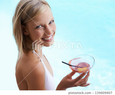 Smile, portrait and woman at swimming pool with cocktail, sunshine and travel for summer holiday at hotel. Relax, water and face of happy girl on luxury vacation with drink, weekend and high angle. Smile, portrait and woman at swimming pool with cocktail, sunshine and travel for summer holiday at hotel. Relax, water and face of happy girl on luxury vacation with drink, weekend and high angle. 139809807