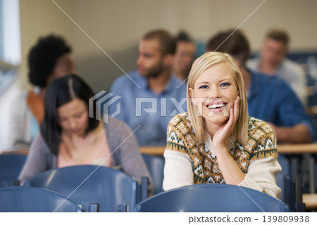 Portrait, confident or happy woman in classroom for knowledge, school development or future. Scholarship, education or face of student with smile or pride for studying or learning in college campus Portrait, confident or happy woman in classroom for knowledge, school development or future. Scholarship, education or face of student with smile or pride for studying or learning in college campus 139809938