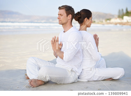 Couple, yoga and beach with meditation, peace and sitting on sand in morning with mindfulness in summer. Man, woman and outdoor for namaste with spiritual growth, balance or zen by ocean in Cape Town 139809941