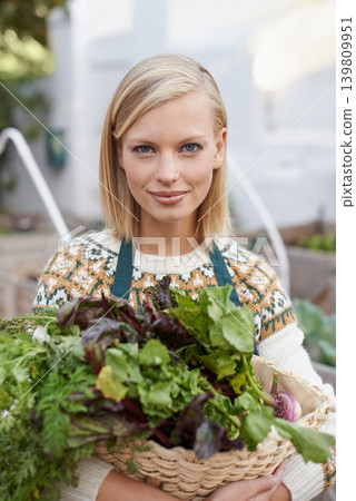 Gardening, vegetables and portrait of woman with plants for landscaping, planting flowers and growth. Agriculture, nature and face of person outdoors for environment, ecology and nursery in garden Gardening, vegetables and portrait of woman with plants for landscaping, planting flowers and growth. Agriculture, nature and face of person outdoors for environment, ecology and nursery in garden 139809951