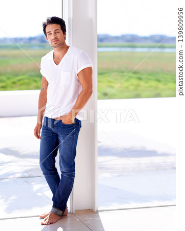 Outdoor, home and portrait of man with fashion, relax or morning on holiday or vacation. Casual, style and calm person in California on break in backyard, patio or garden with guy in jeans and tshirt Outdoor, home and portrait of man with fashion, relax or morning on holiday or vacation. Casual, style and calm person in California on break in backyard, patio or garden with guy in jeans and tshirt 139809956
