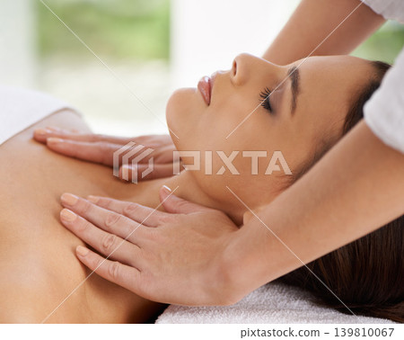 Woman, relax and body massage in spa for rest, wellness and peace with sleeping of healing hands. Person, comfort and masseuse for health treatment with zen, calm and detox on bed in holiday resort Woman, relax and body massage in spa for rest, wellness and peace with sleeping of healing hands. Person, comfort and masseuse for health treatment with zen, calm and detox on bed in holiday resort 139810067