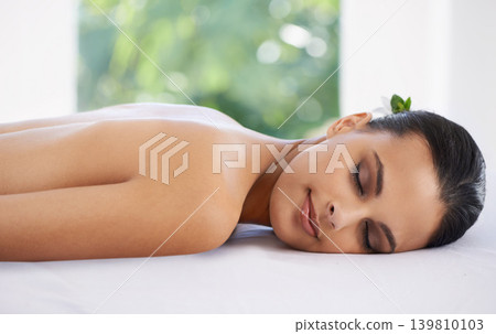 Relax, calm and woman at spa for skincare, massage and peace at table to rest for zen at luxury resort. Beauty, therapy and young person at salon for healthy body, treatment and pamper for wellness Relax, calm and woman at spa for skincare, massage and peace at table to rest for zen at luxury resort. Beauty, therapy and young person at salon for healthy body, treatment and pamper for wellness 139810103