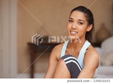 Happy, fitness and portrait of woman relax in home ready for workout, training and exercise. Smile, rest and person after yoga, pilates and warm up for wellness, health and wellbeing in living room Happy, fitness and portrait of woman relax in home ready for workout, training and exercise. Smile, rest and person after yoga, pilates and warm up for wellness, health and wellbeing in living room 139810201