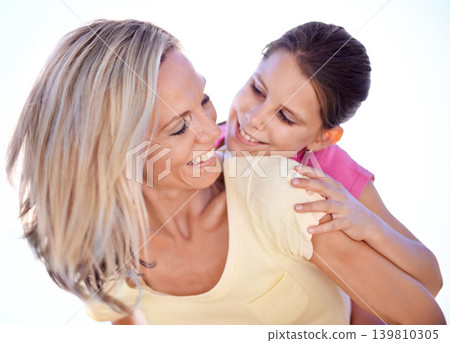 Mother, daughter and happy with piggyback in studio for bonding, support and hug on holiday with relax. Family, woman and girl child with fun, smile and embrace with love or care on white background 139810305