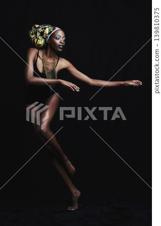 Fashion, beauty and black woman on dark background pose with confidence, style and pride. Culture, aesthetic and isolated African person with cosmetics, trendy accessories and makeup in studio Fashion, beauty and black woman on dark background pose with confidence, style and pride. Culture, aesthetic and isolated African person with cosmetics, trendy accessories and makeup in studio 139810375
