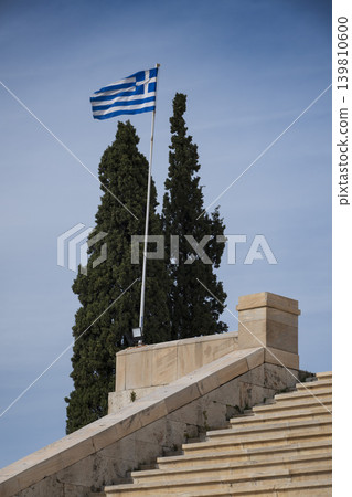 Greek flag flying at the original Olympic Stadium in Athens 139810600