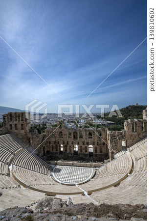 The Odeon of Herodes Atticus at the Acropolis in Athens The Odeon of Herodes Atticus at the Acropolis in Athens 139810602