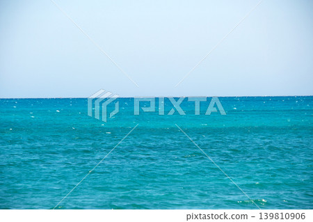 Closeup seascape surface of blue sea water with small ripple waves. 139810906