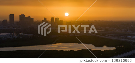 View from above of contemporary high skyscraper buildings in downtown district of Tampa city in Florida, USA at sunset. American megapolis with business financial district 139810993