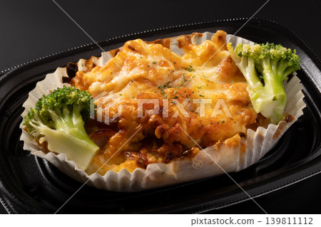 Baked macaroni (rigatoni) with cheese 139811112