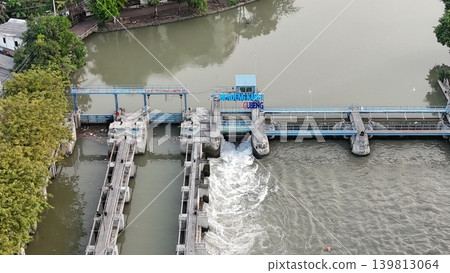 aerial view shows a river dam and water control management system aerial view shows a river dam and water control management system 139813064