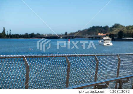 A railing of Elizabeth Quay Bridge, with a view of South Perth in Perth, Australia A railing of Elizabeth Quay Bridge, with a view of South Perth in Perth, Australia 139813082