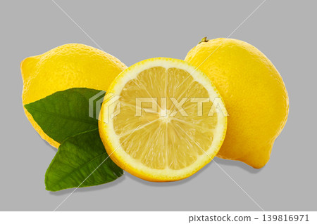 Fresh lemons stacked with one cut open showing juice Fresh lemons stacked with one cut open showing juice 139816971