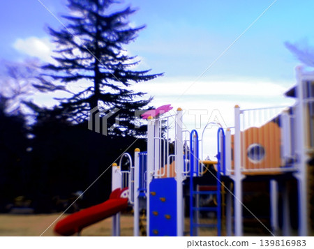 A quiet playground at dusk in winter 139816983