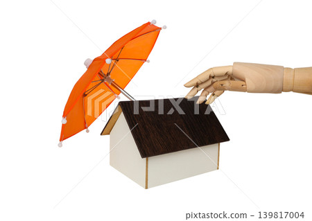 A hand reaches for an umbrella over a small house, isolated, PNG A hand reaches for an umbrella over a small house, isolated, PNG 139817004