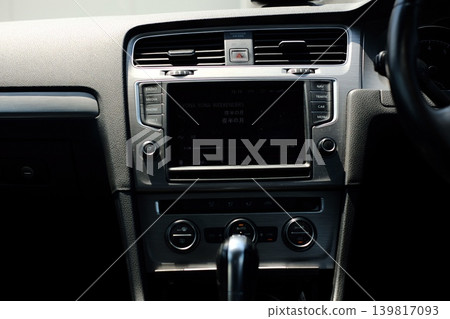 View of the car navigation system from the back seat. 139817093