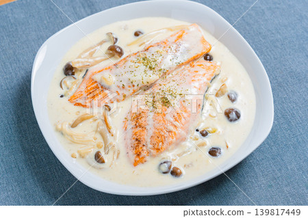 Salmon and mushroom cream stew placed on the table 139817449